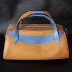 made in spain brown and blue duffle bag