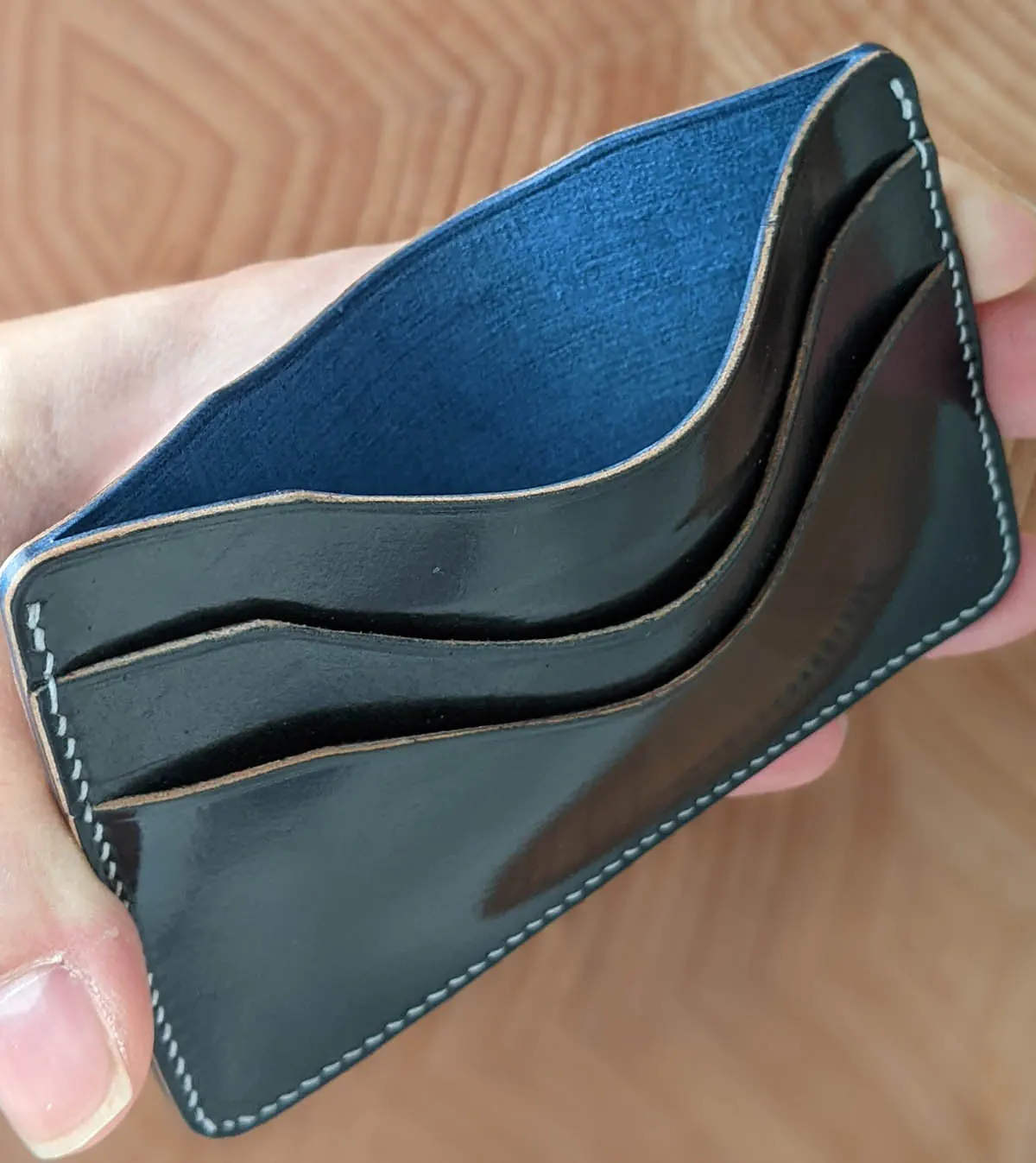 possala designs black glazed wallet with blue