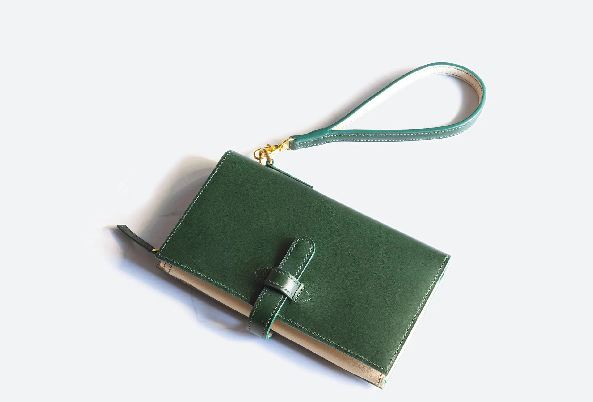 green leather long wallet with wristlet