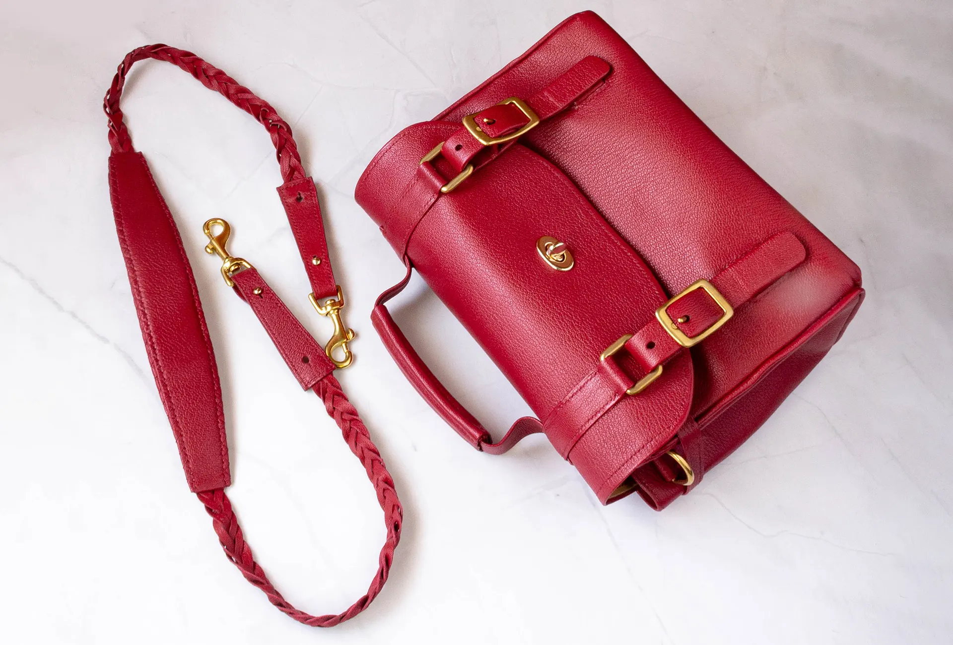 possala designs red leather satched bag