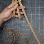 possala designs handmade in asturias beige calfskin structured flap baguette bag with gold plated hardware